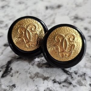 Guerlain vintage goldtone & black clip on earrings.
